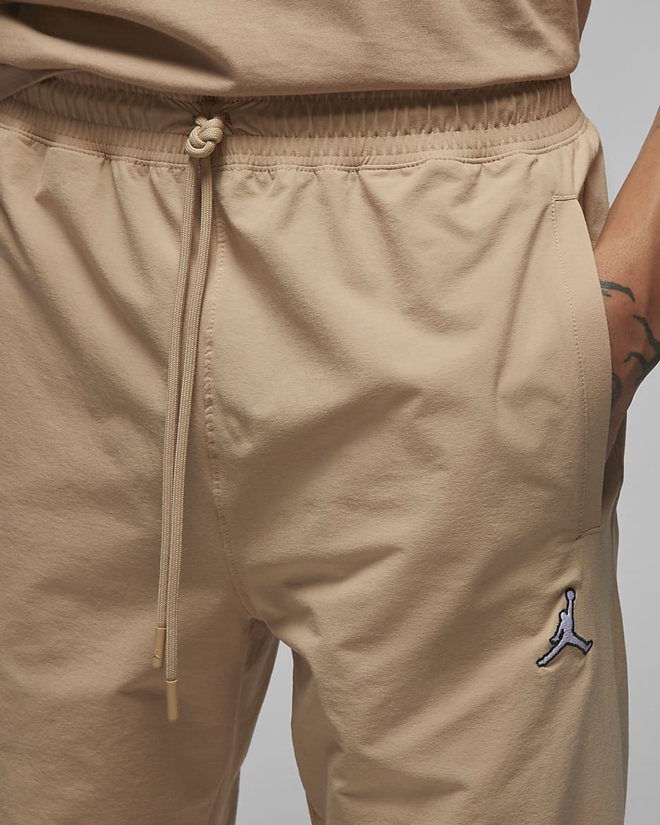 Nike men's essential woven pants discount